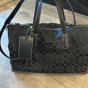 Women’s Coach travel bag.